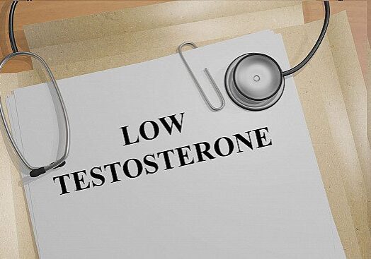 Document labeled "Low Testosterone" with stethoscope.
